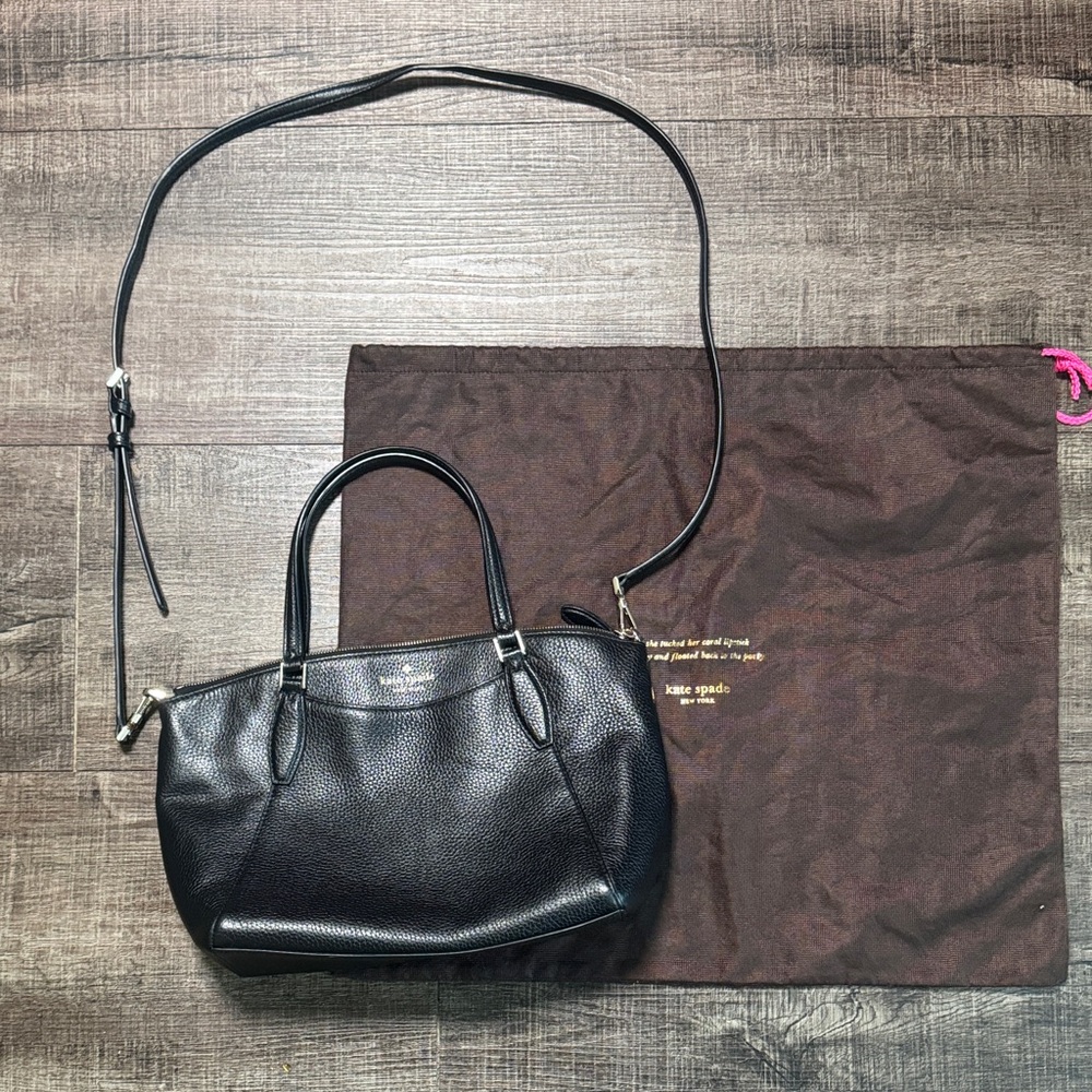 Kate Spade Monica satchel in black pebbled leather.
